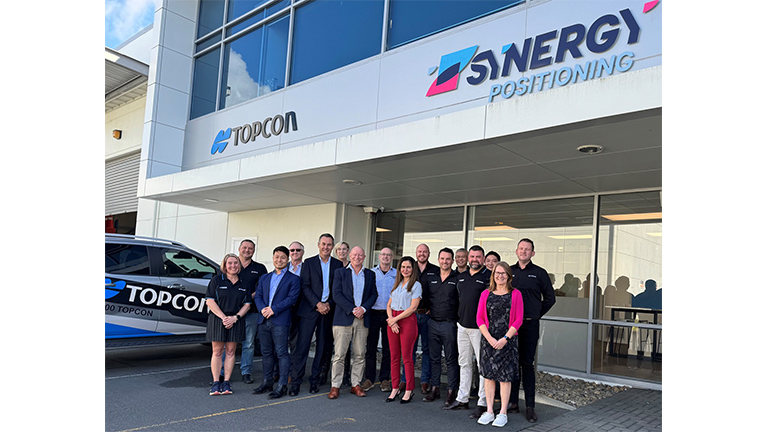 Leadership team of Aptella and Synergy in front of Synergy's head office in Auckland